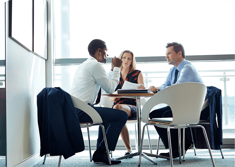 Colleagues collaborating at round table