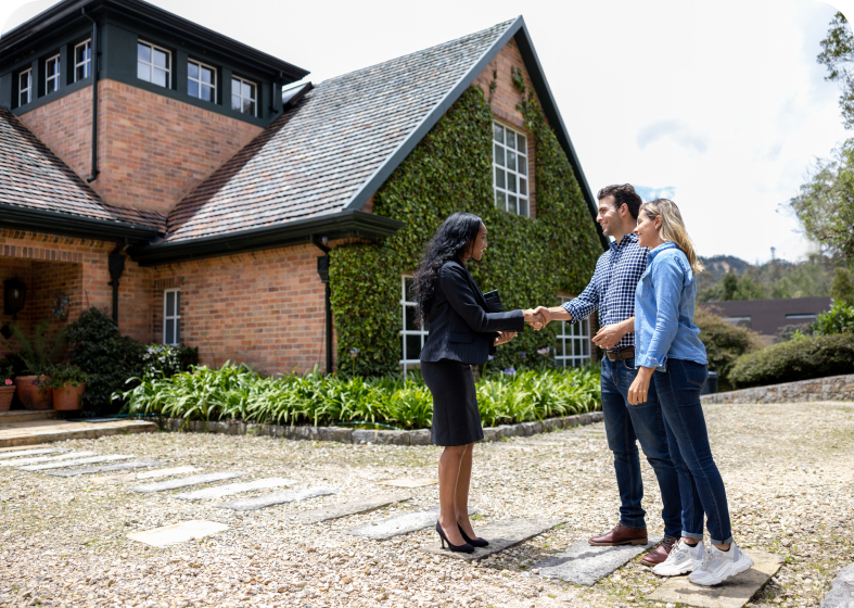 Couple meeting real estate agent